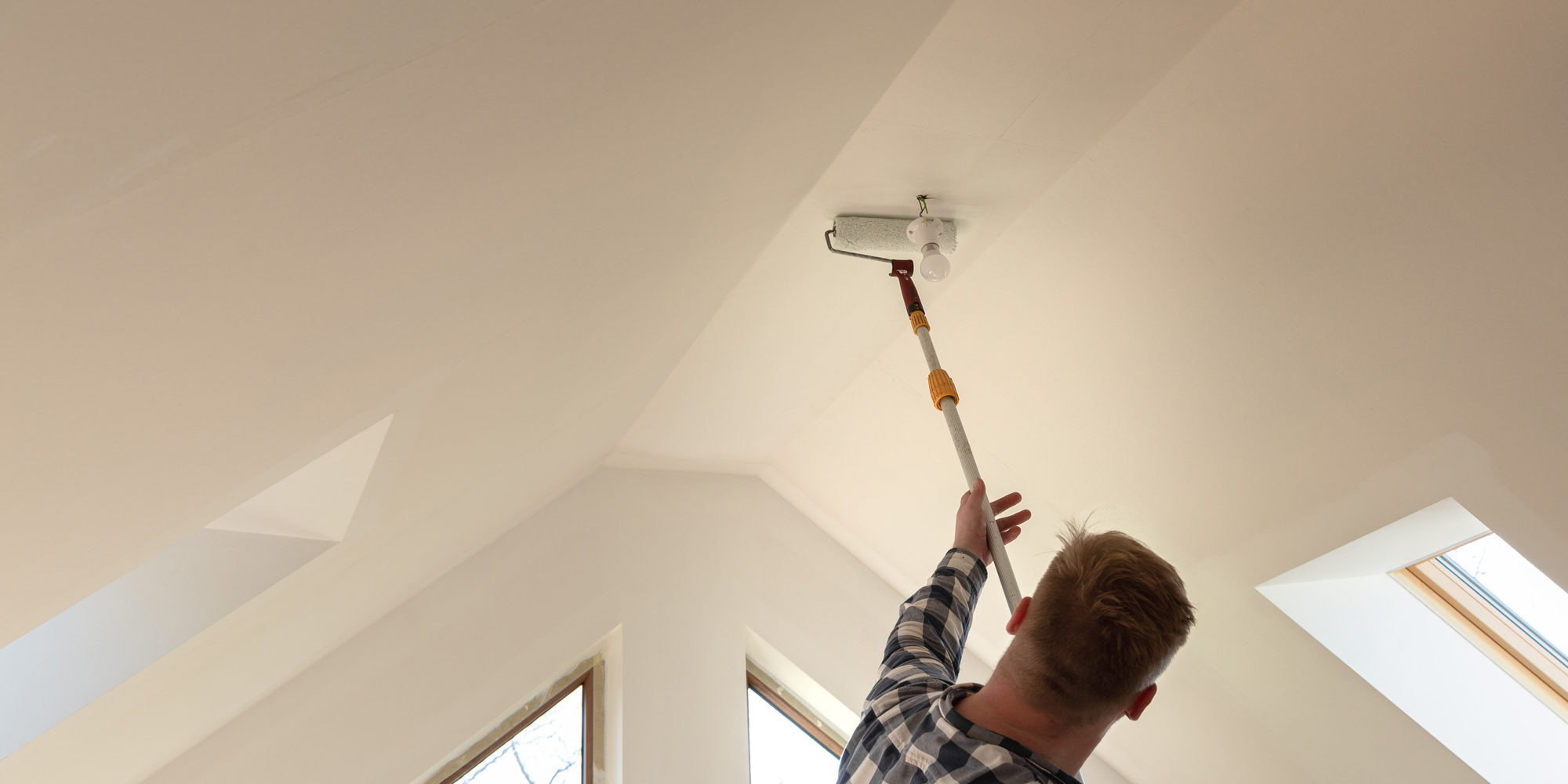 man-painting-ceiling